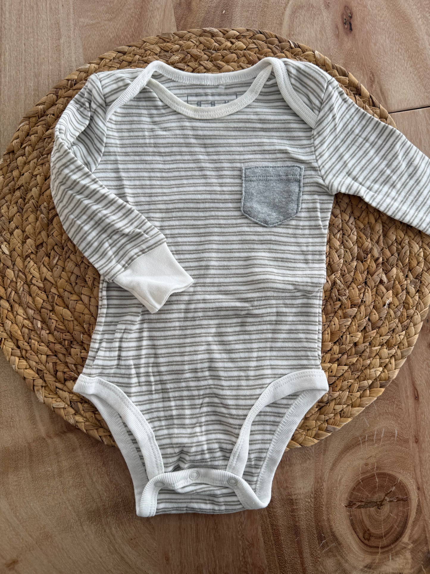 Cache couche 6-9 mois