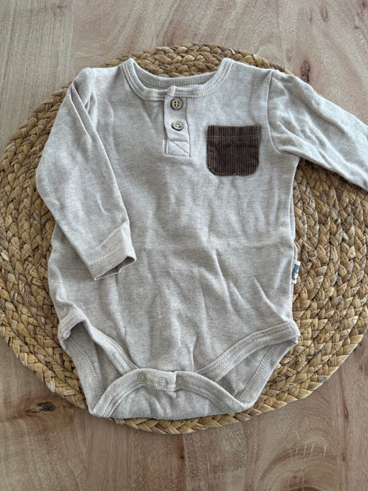 Cache couche 6-9 mois